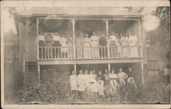 Group of Women and Child at Two-Story House Postcard