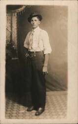 Studio Portrait, Person in Hat and Suspenders Postcard