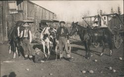 Three Cowboys Posing with Horses and Cow Postcard