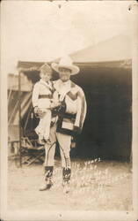 Rare: Cowboy Tom Mix Holding Child Bates H Russell Postcard