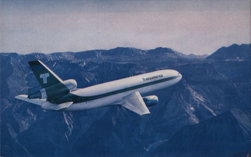 Transamerica Airlines DC-10-30 Flying Over Mountains