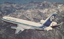 Air New Zealand DC-10 Over Mountain Range Postcard
