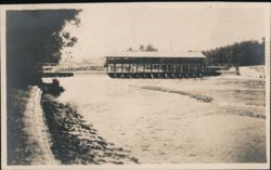 Covered Walkway Over River Weir Postcard