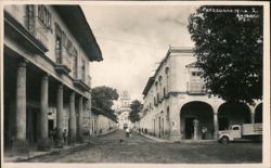 Pátzcuaro, MICH. Street View with Arcades & Church Postcard