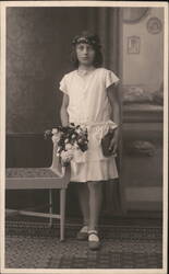 Young Girl with Flowers and Book, Studio Portrait Postcard