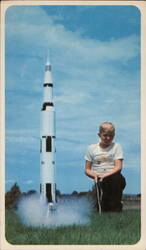 Boy Launching Estes Saturn V Model Rocket, Penrose, CO Postcard
