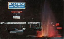 Rodeway Inn of Boise, Idaho at Night Postcard