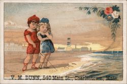 Children Writing 'I LOVE YOU' in Sand, Lighthouse Background Trade Card