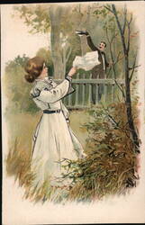 Woman Reaching Over Fence to Man Tipping Hat with Handkerchief Postcard