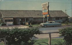 Covered Wagon Motel and 1956 Cadillac, Buena Park, CA Postcard