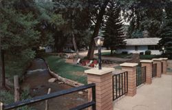 Green Willow Motel by a Quiet Mountain Stream Postcard