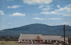 The Gray House with a panoramic view of Mt. Kearsarge Postcard