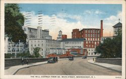 The Mill District from So. Main Street, Woonsocket, RI Postcard