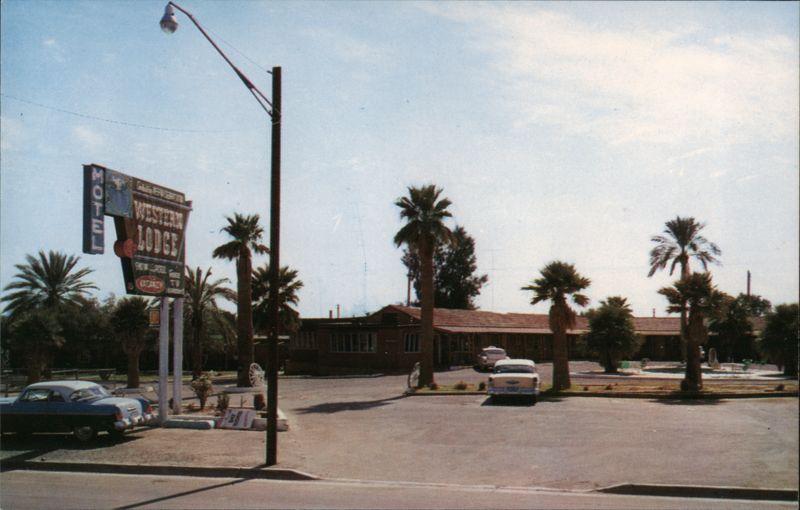 Western Lodge Motel with Palm Trees and Cars Gila Bend Arizona