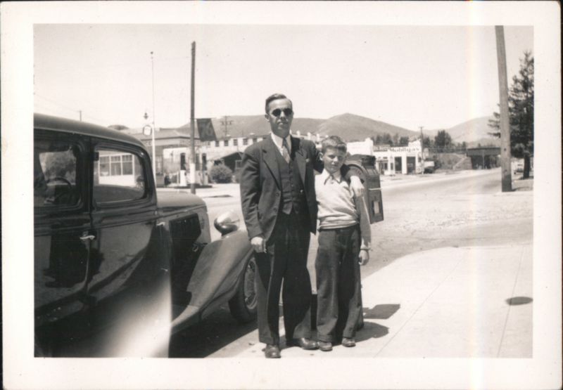 Man and Boy with Car, Mobilgas Station in Background