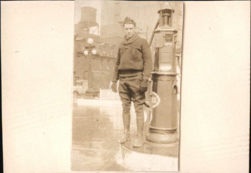 Young Men in Sweaters, Outdoor Scenes Gas Stations