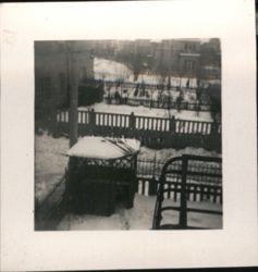 Snowy Backyard with Structure and Fenced Garden in Winter Original Photograph