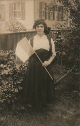 Woman with French Flag in Garden Postcard