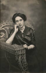 Woman in Wicker Chair, Studio Portrait Postcard