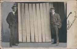 Two Men in Suits and Hats with long string of Papers "A Long Letter" Postcard