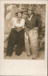 Cowboy and Cowgirl in Fur Chaps, Studio Portrait Postcard