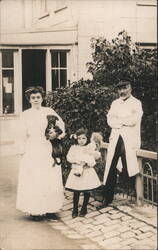 Family Portrait with Dog and Dolls Postcard