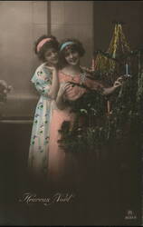 Two Women with Christmas Tree, Heureux Noël Postcard