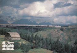 Amtrak Superliner Empire Builder in Glacier National Park Postcard