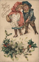 Christmas Children in Snow with Holly and Mistletoe Postcard