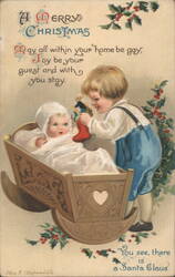 Merry Christmas Children with Baby in Cradle, Boy Holds Stocking Postcard