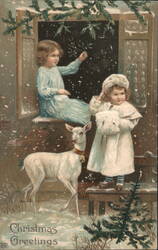 Christmas Greetings with Girls, Deer, and Mistletoe in Snow Postcard