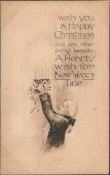 Child with Mistletoe & Candles, Happy Christmas & New Year's Tide Greeting Postcard