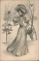 Elegant Woman in Snowy Landscape with Birds, Mistletoe, and Bird Feeder Postcard