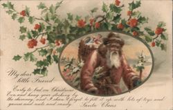 Santa Claus with Basket of Toys and Holly Border Christmas Greeting Postcard