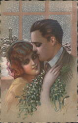 Man Kisses Woman Under Mistletoe in Snowy Winter Scene Postcard