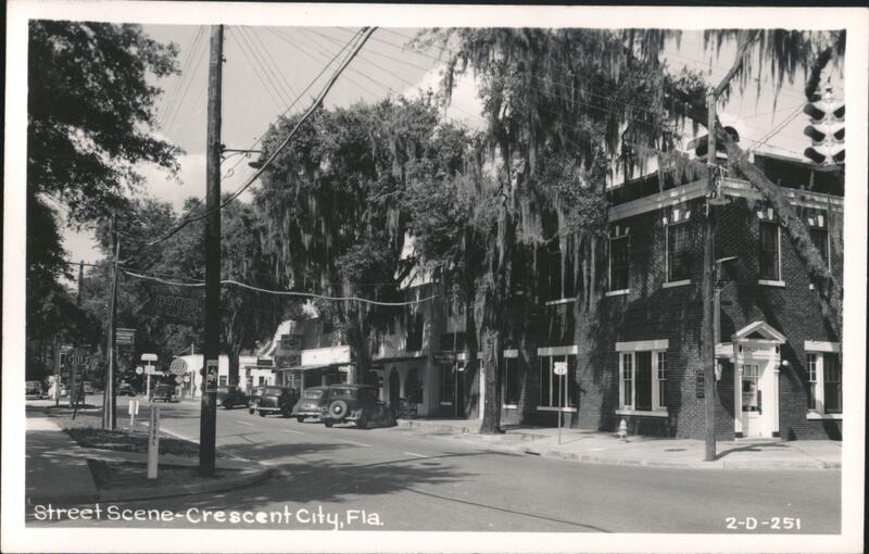 Street Scene with Businesses, Cars, Trees, Crescent City, FL Florida