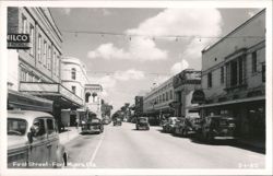 First Street Scene with Cars and Businesses - Fort Myers, FL Postcard