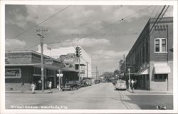 Wauchula, Florida Main Street Scene with Rexall Drugs and Coca-Cola Signs Postcard