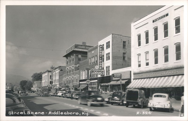 Street Scene with Vintage Cars, Perry & Pope Drugs, Scott Stores Middlesboro Kentucky