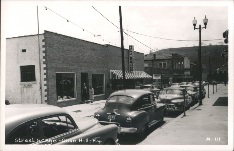 Street Scene with Vintage Cars and Businesses Olive Hill Kentucky