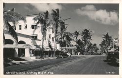 Street Scene with The Colony Hotel and Palm Trees Postcard