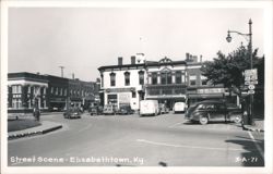 Street Corner with Lex Drug Co., Geo. W. Rihn & Co., and Akin's Stores Postcard