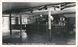 Free Museum, Lost River Cave Interior with Guns on Ceiling Postcard
