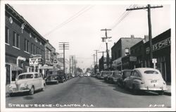 Street Scene with Clanton Jewelry, Hotel, Bakery, Hayes Chevrolet Postcard