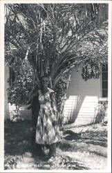 Woman Posing by Date Palm Tree, 'Have a date with me Postcard