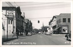 Street Scene with Montgomery Hotel Sign and Shops Postcard