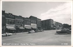 Street Scene with McBride's, Gooch Drug, Goodners, Nelson Drug Co. Postcard