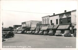 Street Scene with Parked Cars and Storefronts Postcard