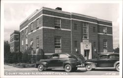 Court House with Vintage Cars Parked in Front Postcard