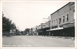 Street Scene with National Store, Pom Drug Store, Bendix Laundry Postcard